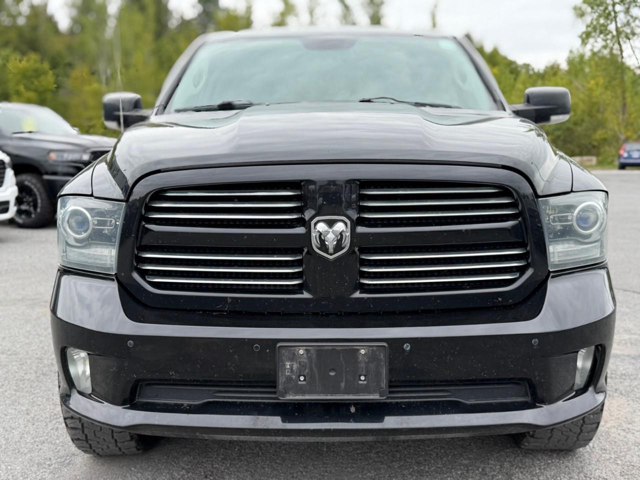 2014 RAM 1500 4WD Crew Cab 5.7 Ft Box Sport Photo