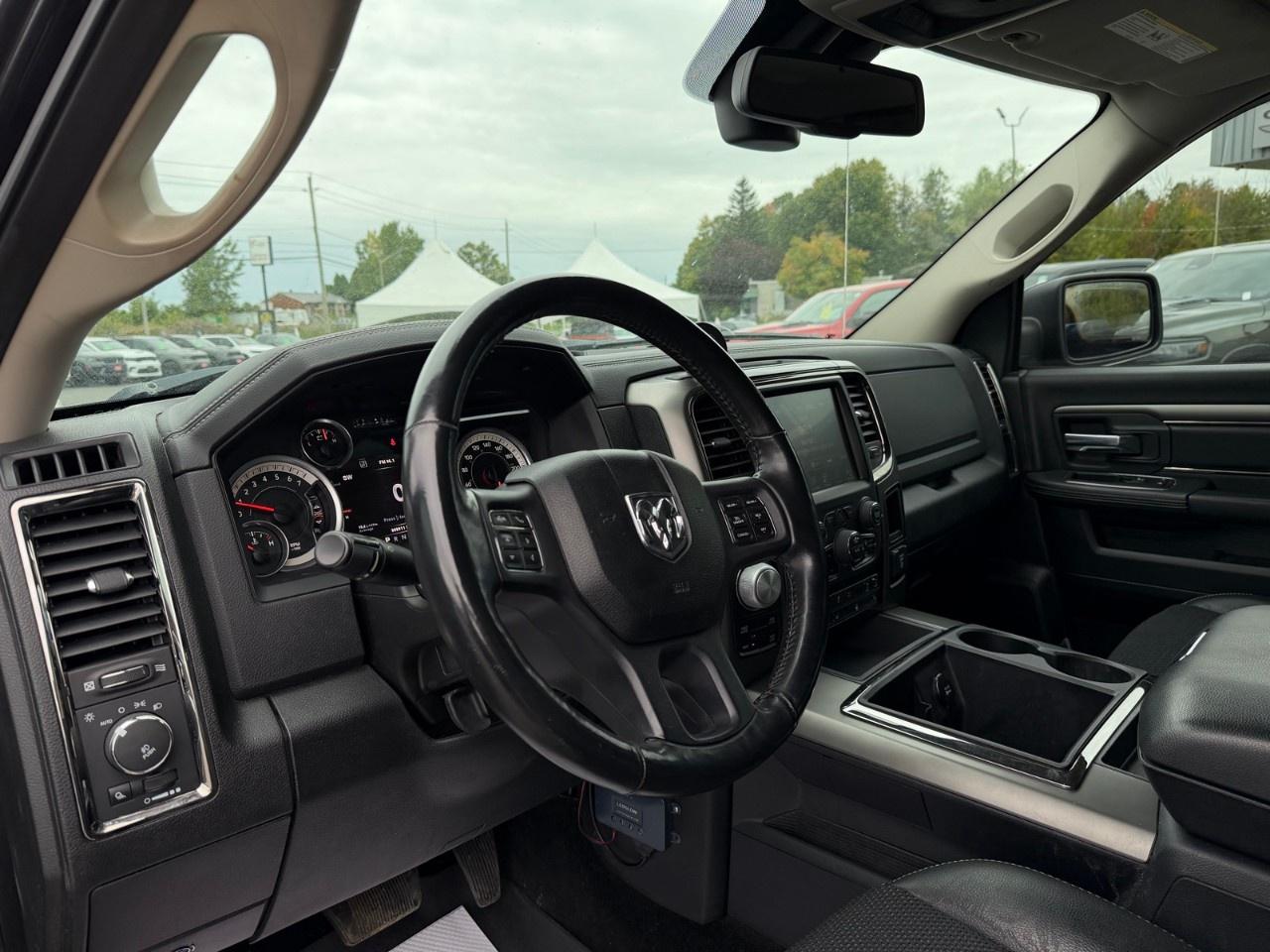 2014 RAM 1500 4WD Crew Cab 5.7 Ft Box Sport Photo