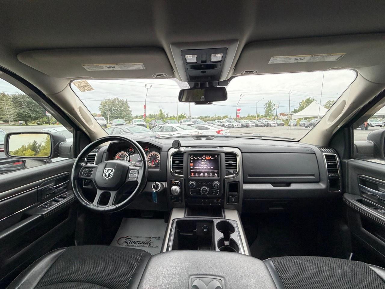 2014 RAM 1500 4WD Crew Cab 5.7 Ft Box Sport Photo