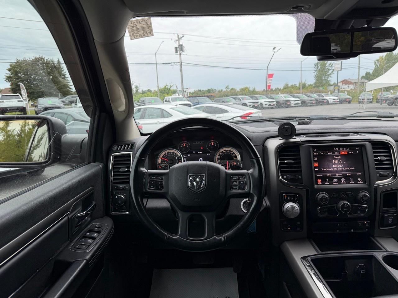 2014 RAM 1500 4WD Crew Cab 5.7 Ft Box Sport Photo