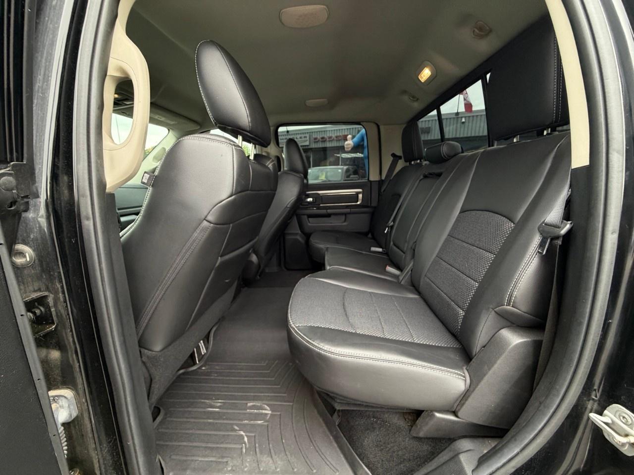 2014 RAM 1500 4WD Crew Cab 5.7 Ft Box Sport Photo