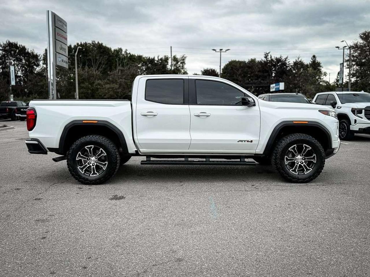 2024 GMC Canyon AT4   AT4 PREMIUM   VENTILATED LEATHER   BOSE AUDIO   PROGRADE TRAILERING   HARD TONNEAU COVER Photo