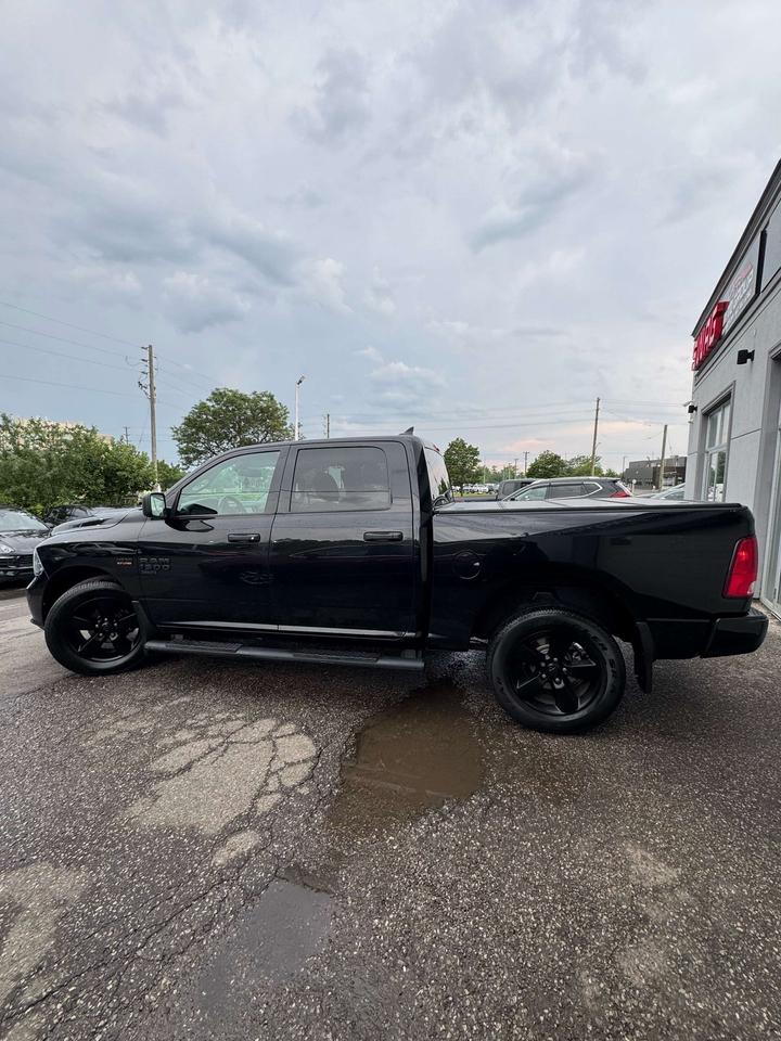 2019 RAM 1500 Express 4x4 Crew Cab 5'7 Box Photo4