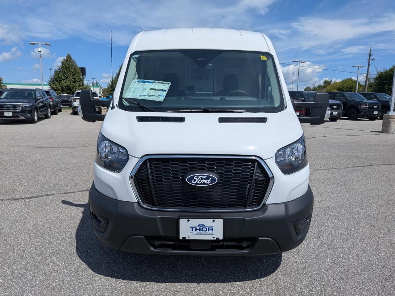 2026 Ford Transit Cargo Van T-250 148" Med Rf 9070 GVWR AWD Photo1