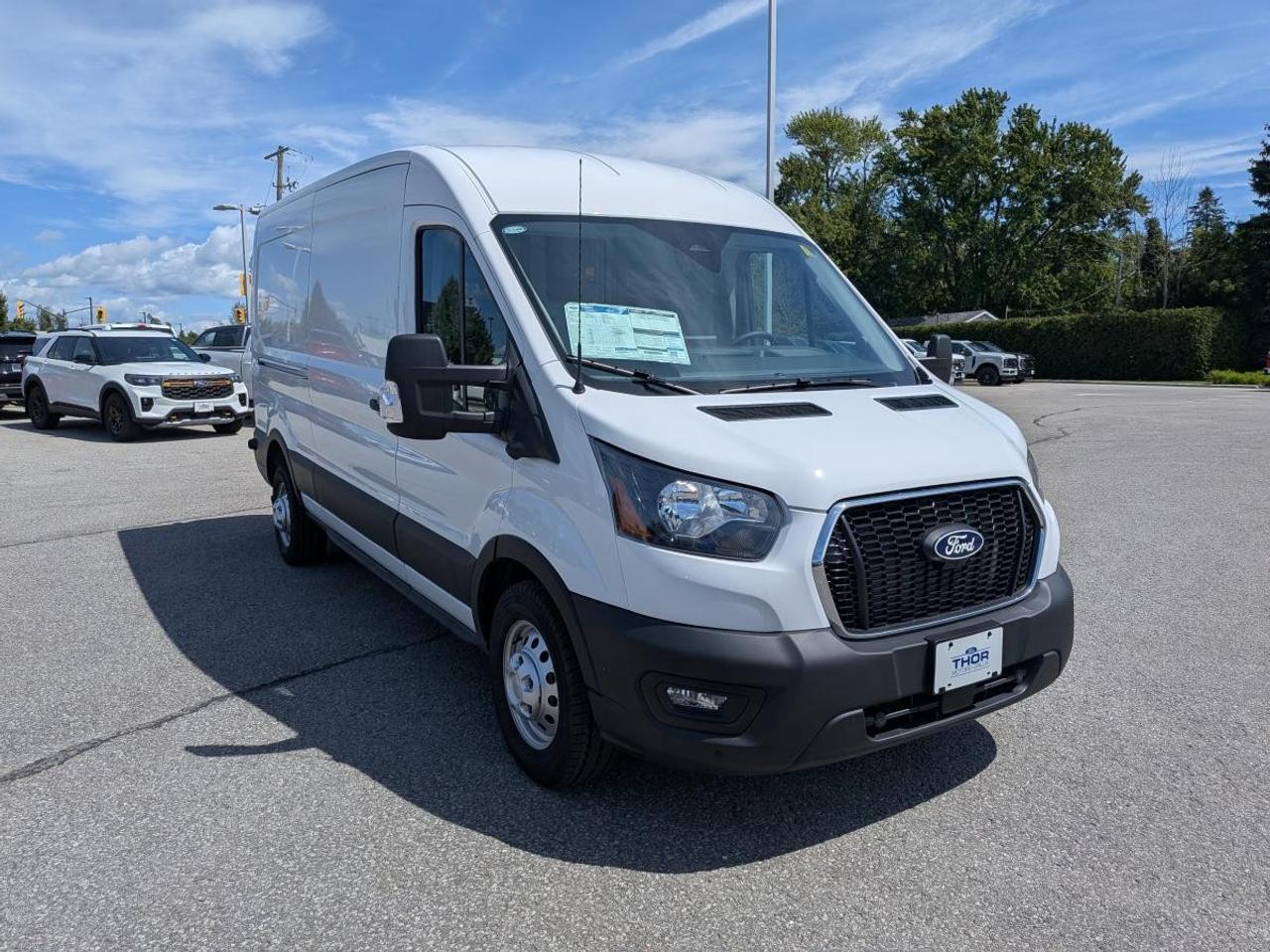 2026 Ford Transit Cargo Van T-250 148" Med Rf 9070 GVWR AWD Photo2