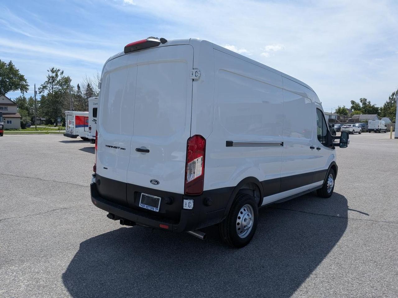 2026 Ford Transit Cargo Van T-250 148" Med Rf 9070 GVWR AWD Photo