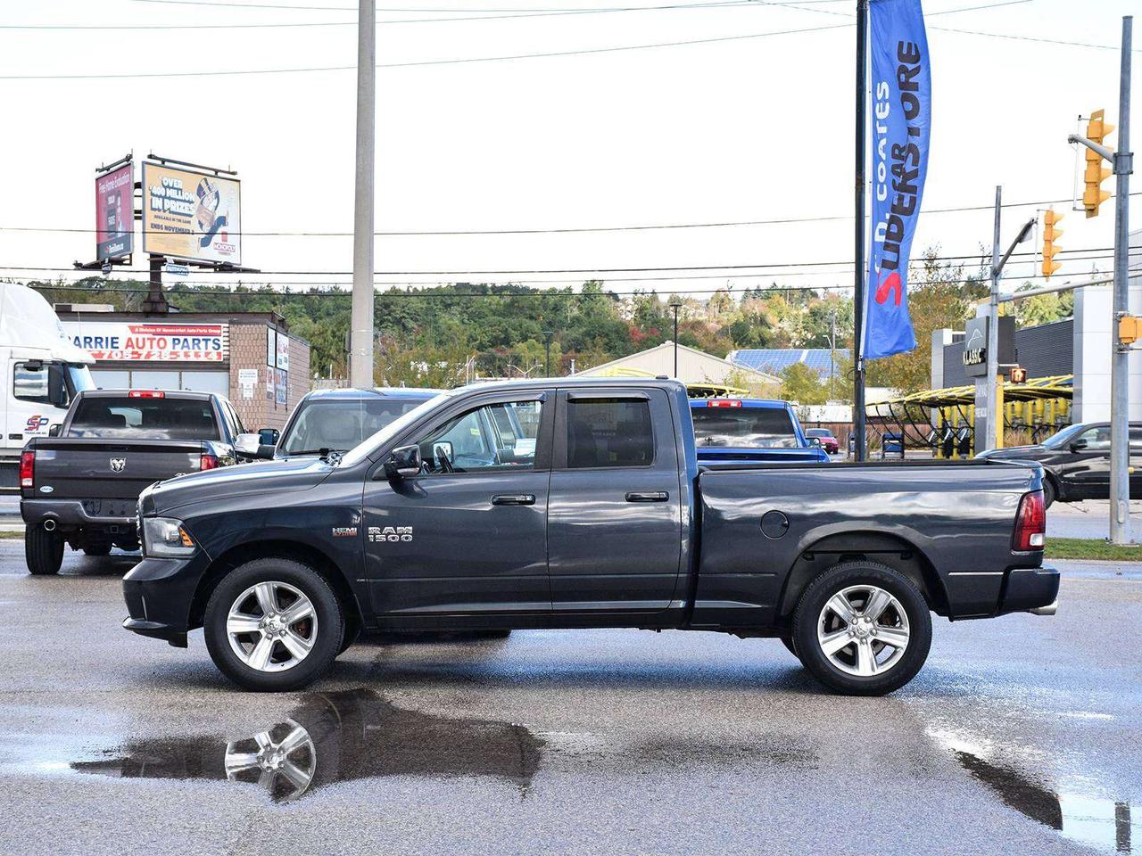 2014 RAM 1500 Sport Quad Cab 4x4 ~HEMI ~Nav ~Camera ~Bluetooth Photo