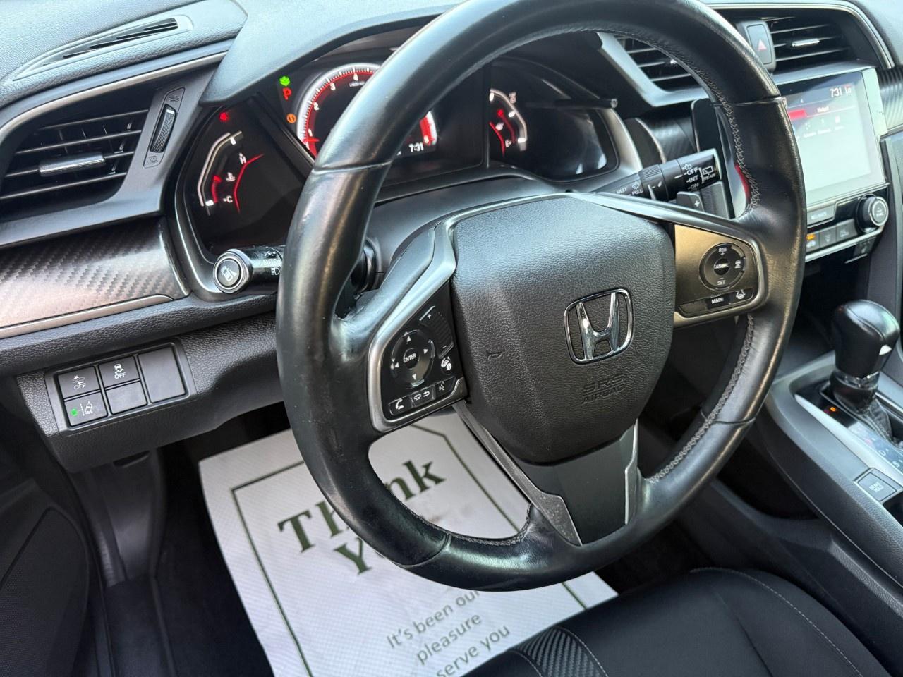 2017 Honda Civic Hatchback Sport CVT Hatchback with Honda Sensing Photo