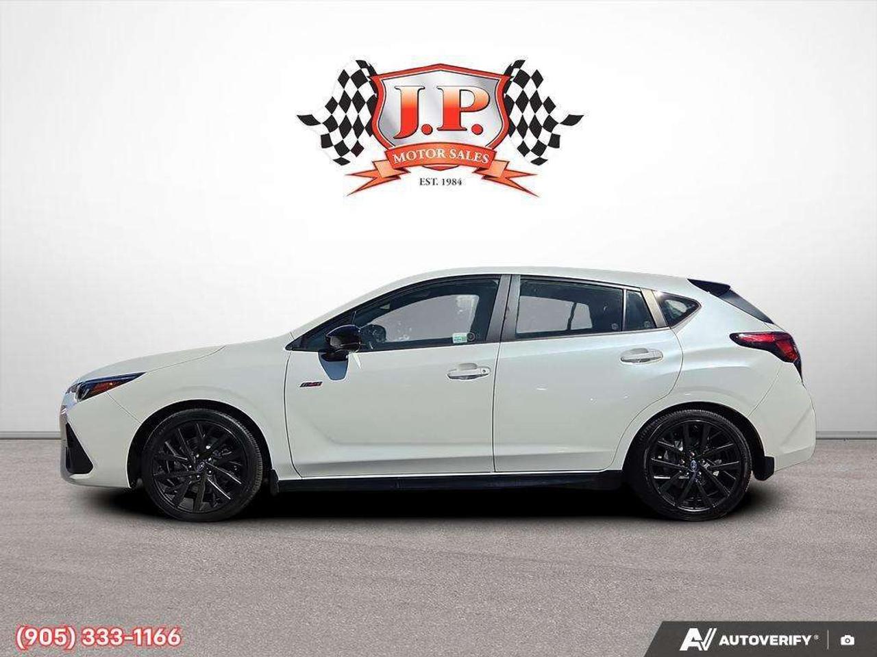2024 Subaru Impreza RS Apple CarPlay & Android Auto • Power Sunroof • Heated Front Seats • Lane Assist • Power Driver Seat • SiriusXM® Satell Photo