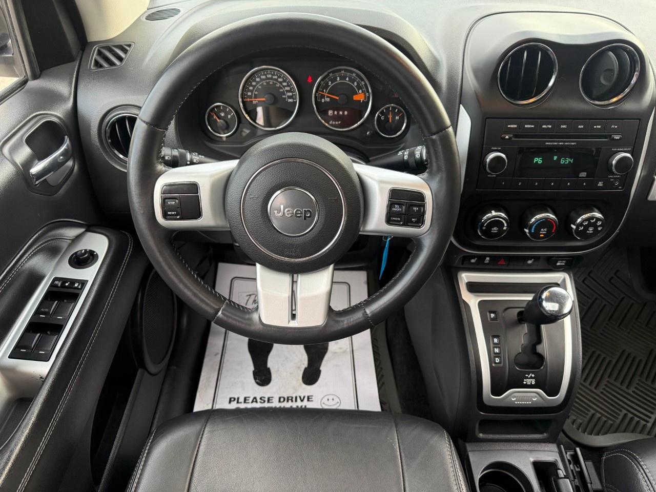 2015 Jeep Compass FWD 4DR HIGH ALTITUDE Photo
