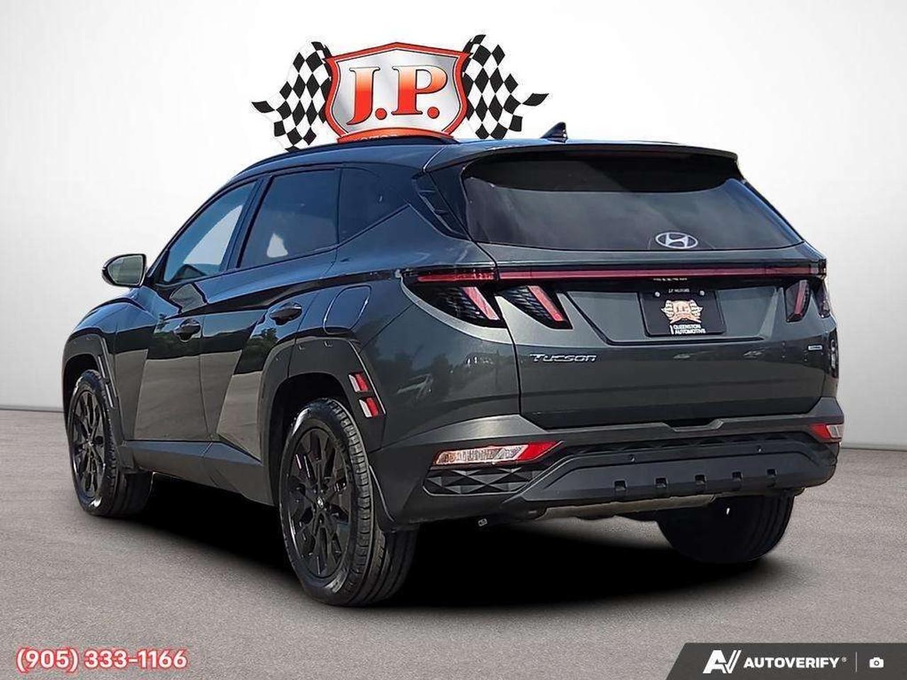 2023 Hyundai Tucson Apple CarPlay & Android Auto • Power Sunroof • Leather Seating • Built-In Navigation System • Remote Start System • Heate Photo