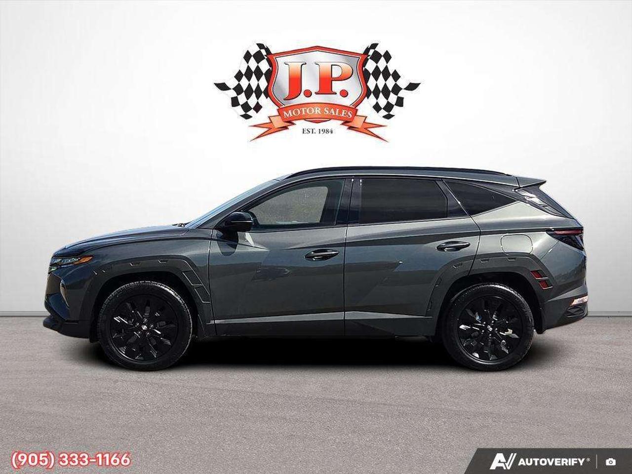 2023 Hyundai Tucson Apple CarPlay & Android Auto • Power Sunroof • Leather Seating • Built-In Navigation System • Remote Start System • Heate Photo