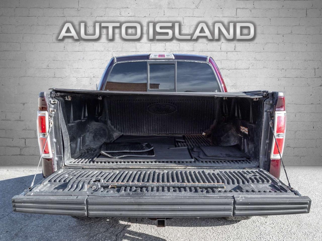 2012 Ford F-150 4WD SuperCrew 145 Lariat Photo