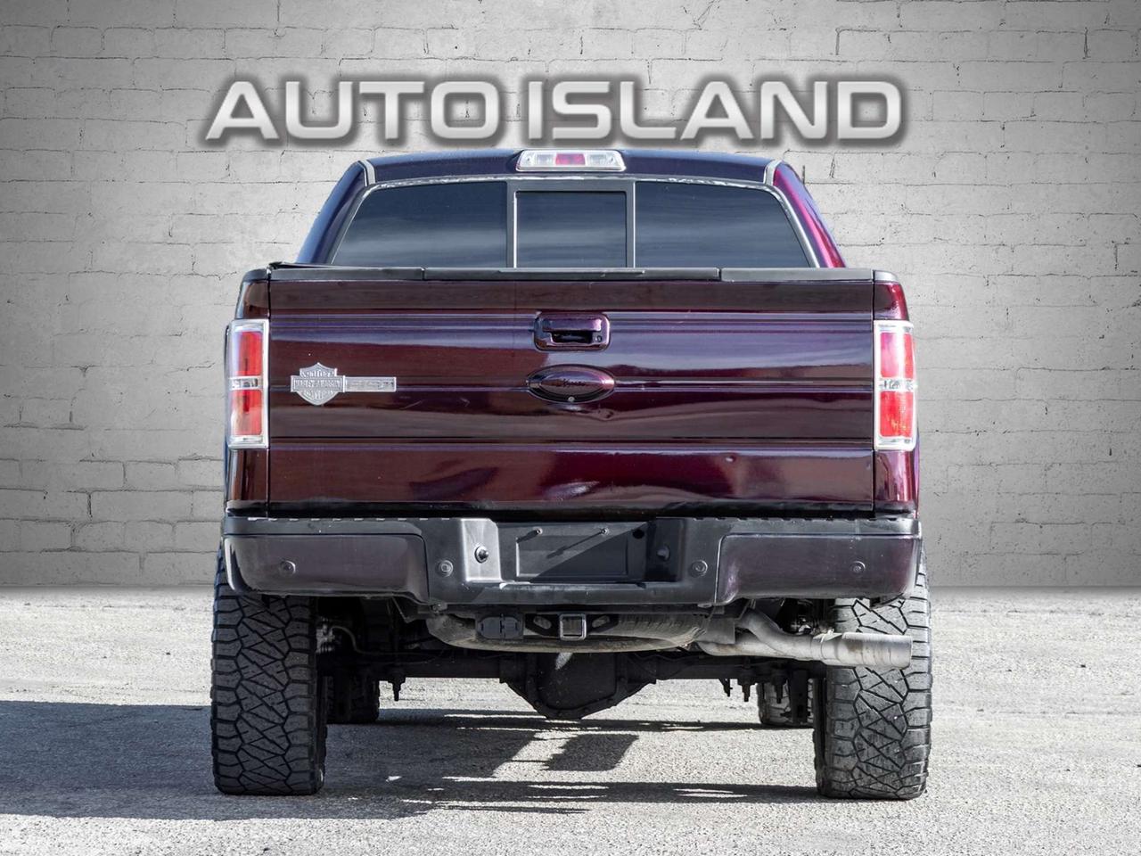 2012 Ford F-150 4WD SuperCrew 145 Lariat Photo