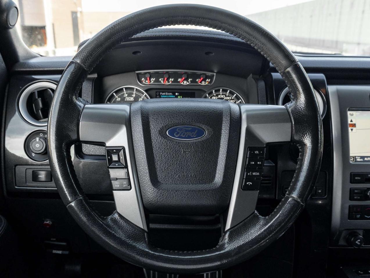 2012 Ford F-150 4WD SuperCrew 145 Lariat Photo