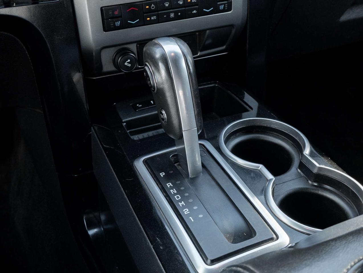 2012 Ford F-150 4WD SuperCrew 145 Lariat Photo