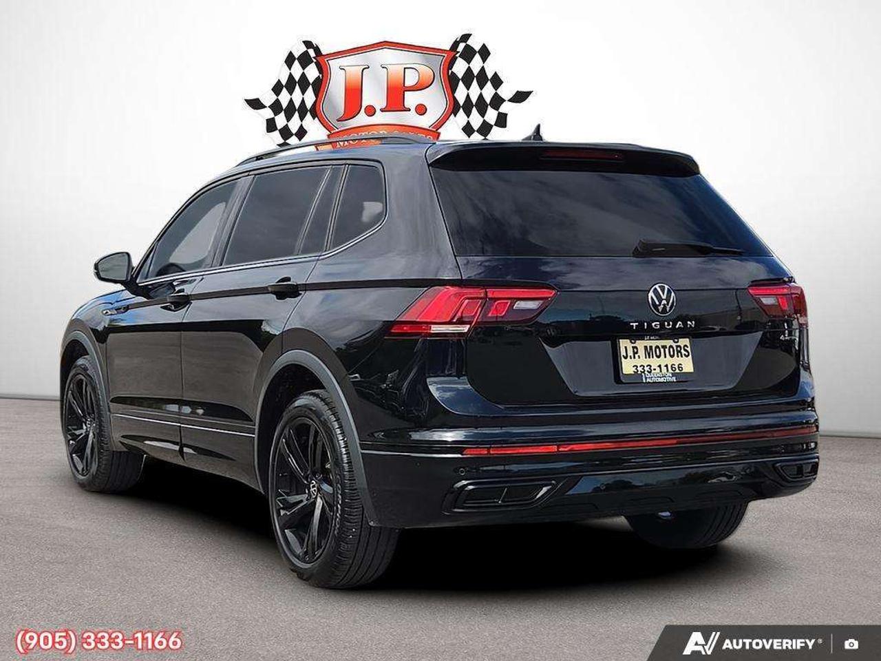2023 Volkswagen Tiguan Comfortline R-Line Black Apple CarPlay & Android Auto • Power Sunroof • Built-In Wi-Fi Hotspot • Remote Start System • He Photo