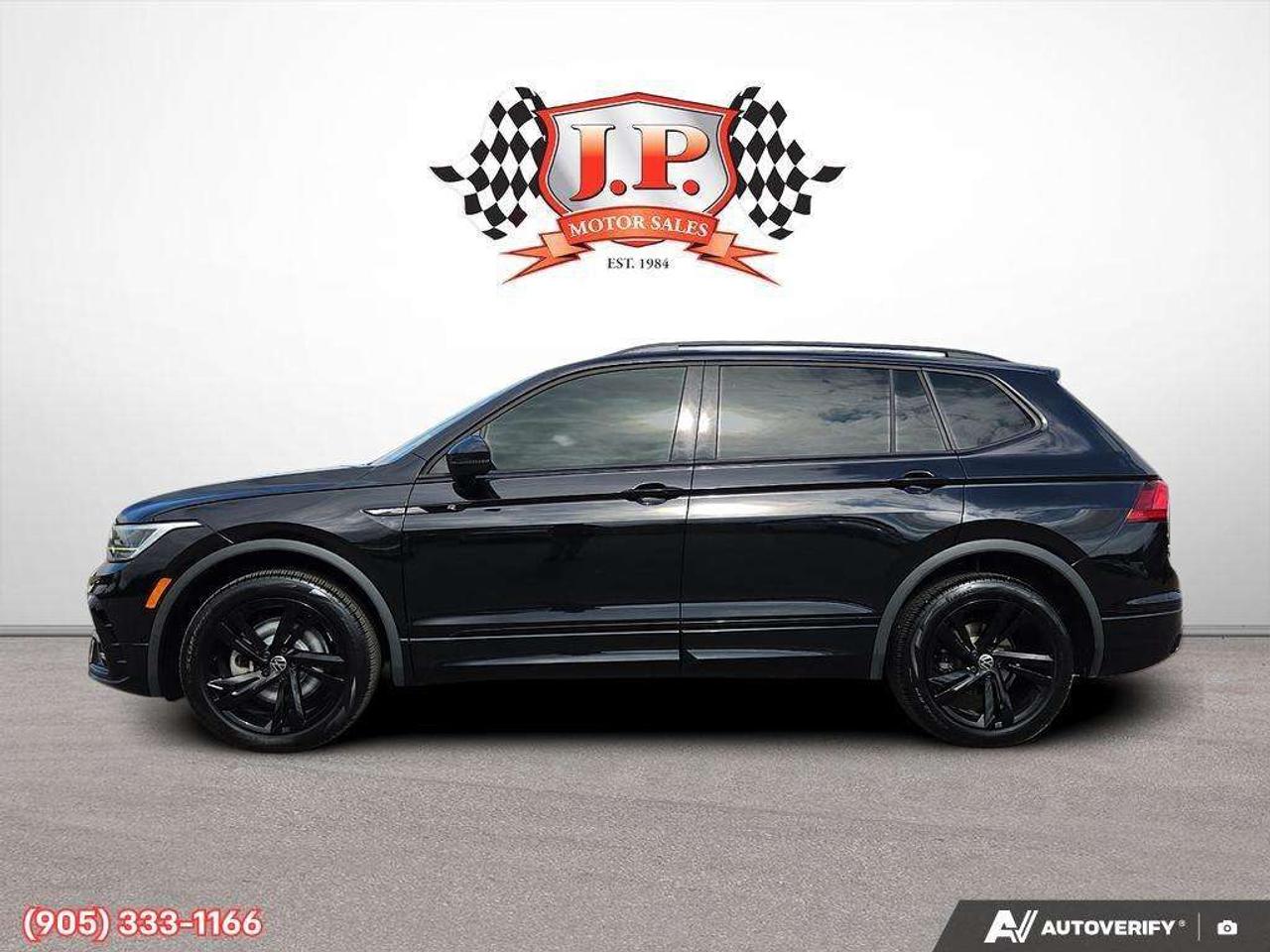 2023 Volkswagen Tiguan Comfortline R-Line Black Apple CarPlay & Android Auto • Power Sunroof • Built-In Wi-Fi Hotspot • Remote Start System • He Photo3