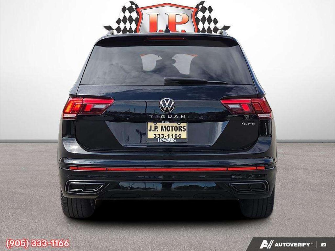 2023 Volkswagen Tiguan Comfortline R-Line Black Apple CarPlay & Android Auto • Power Sunroof • Built-In Wi-Fi Hotspot • Remote Start System • He Photo