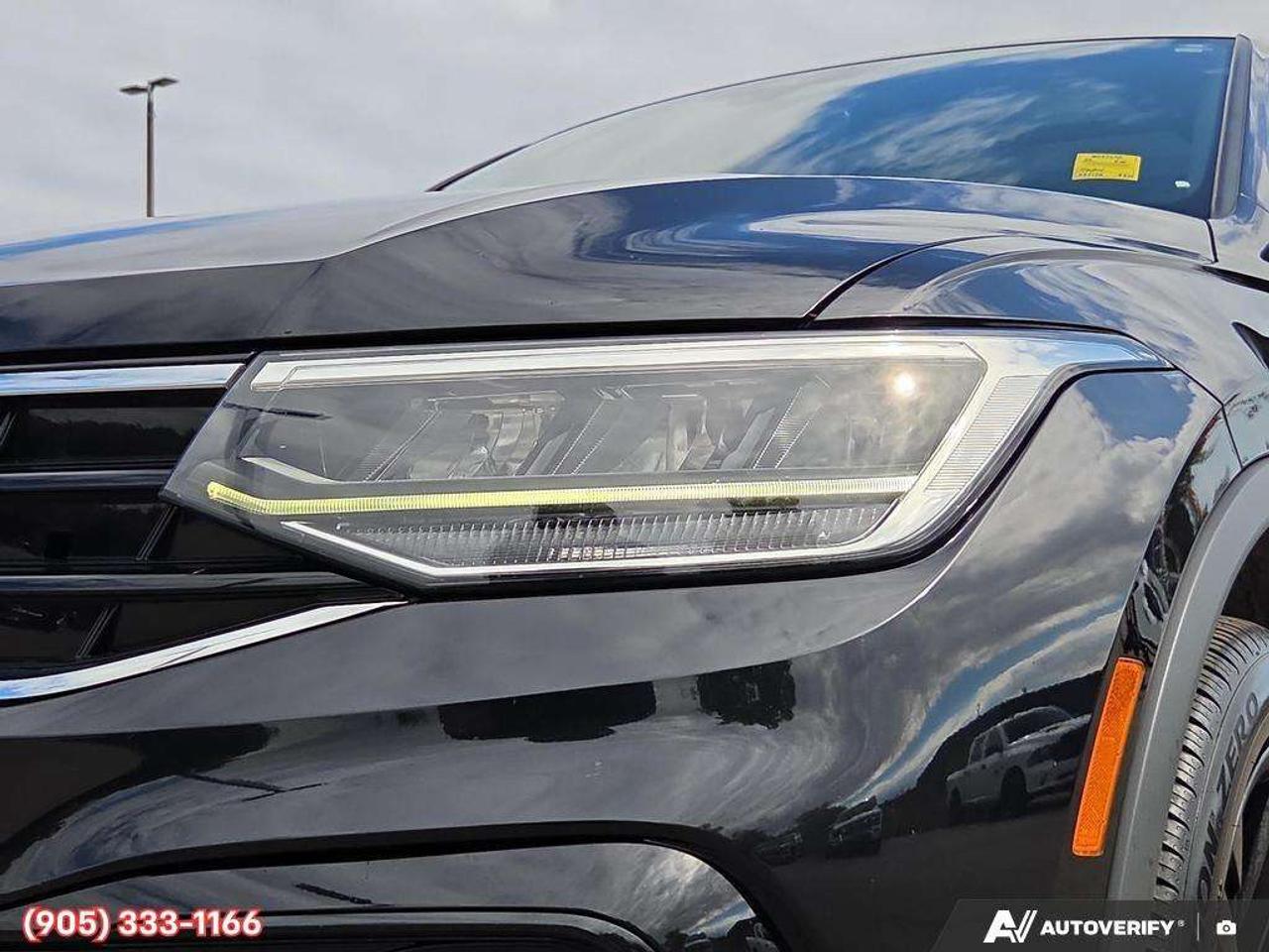 2023 Volkswagen Tiguan Comfortline R-Line Black Apple CarPlay & Android Auto • Power Sunroof • Built-In Wi-Fi Hotspot • Remote Start System • He Photo