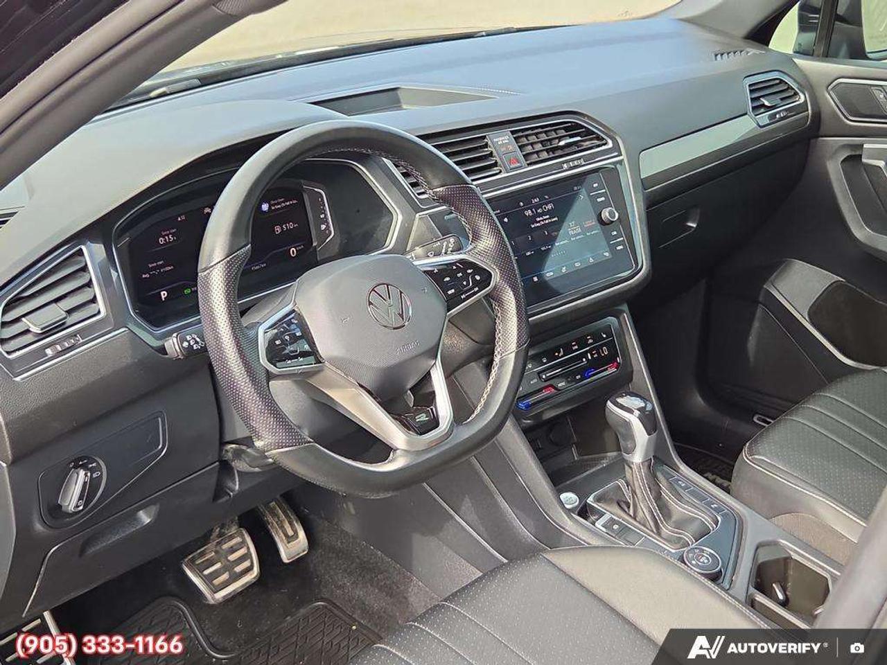 2023 Volkswagen Tiguan Comfortline R-Line Black Apple CarPlay & Android Auto • Power Sunroof • Built-In Wi-Fi Hotspot • Remote Start System • He Photo