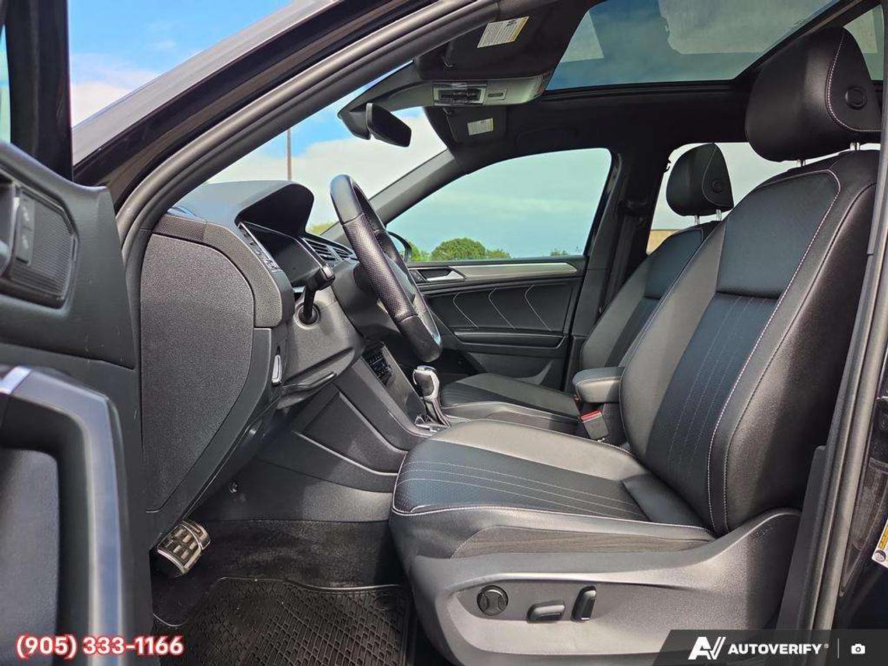 2023 Volkswagen Tiguan Comfortline R-Line Black Apple CarPlay & Android Auto • Power Sunroof • Built-In Wi-Fi Hotspot • Remote Start System • He Photo