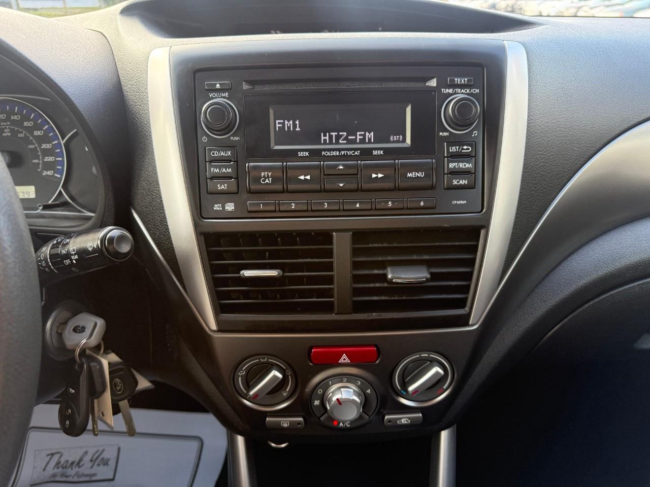 2013 Subaru Forester 5dr Wgn Auto 2.5X Touring Photo