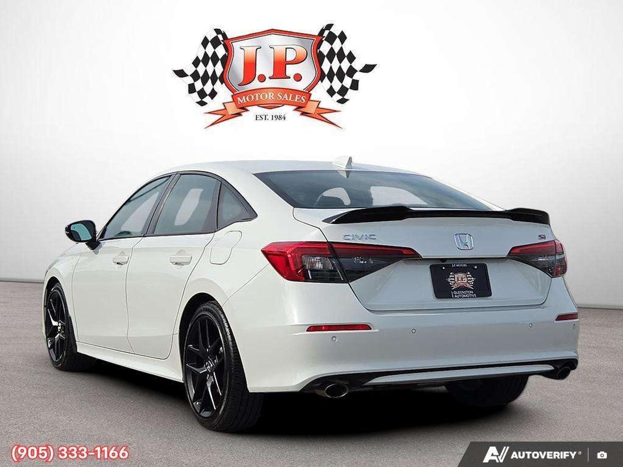 2023 Honda Civic Apple CarPlay & Android Auto • Power Sunroof • Built-In Navigation System • Built-In Wi-Fi Hotspot • Heated Front Seats • Photo