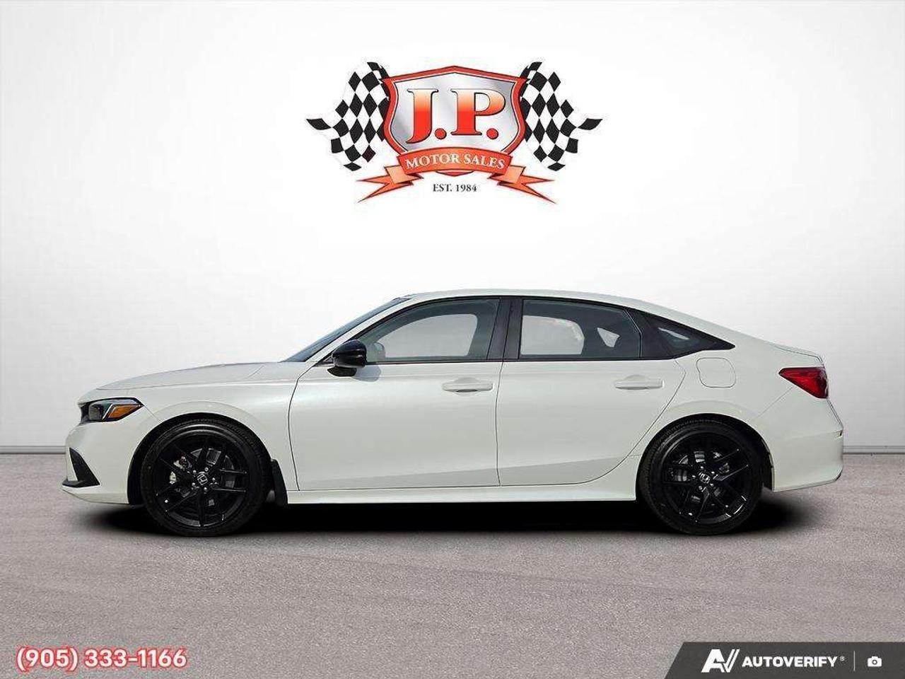 2023 Honda Civic Apple CarPlay & Android Auto • Power Sunroof • Built-In Navigation System • Built-In Wi-Fi Hotspot • Heated Front Seats • Photo3
