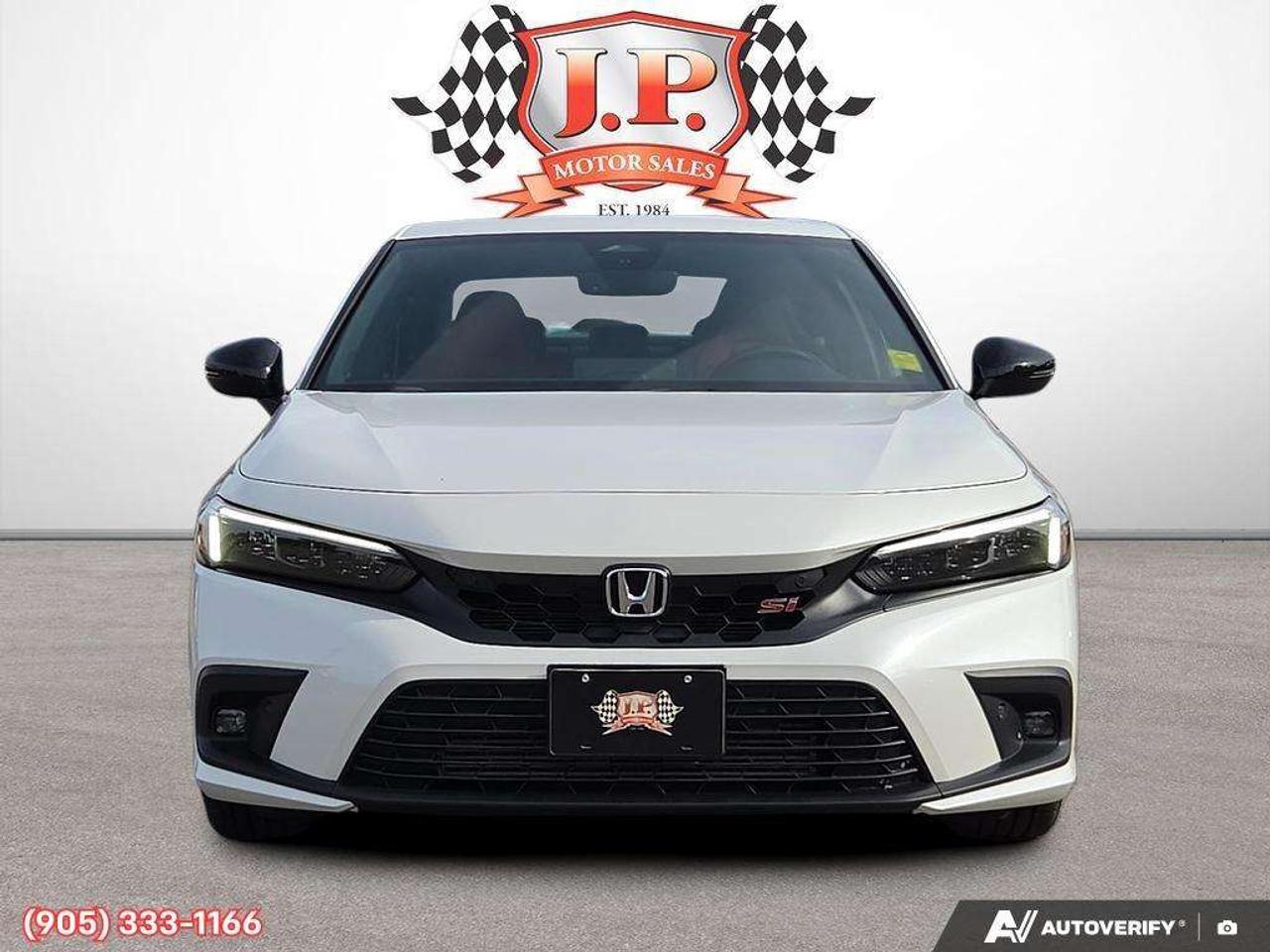 2023 Honda Civic Apple CarPlay & Android Auto • Power Sunroof • Built-In Navigation System • Built-In Wi-Fi Hotspot • Heated Front Seats • Photo