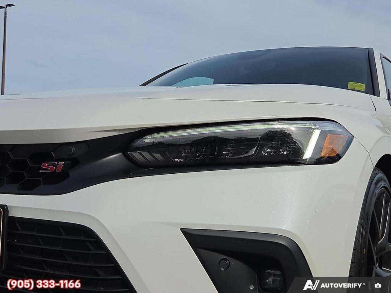 2023 Honda Civic Apple CarPlay & Android Auto • Power Sunroof • Built-In Navigation System • Built-In Wi-Fi Hotspot • Heated Front Seats • Photo