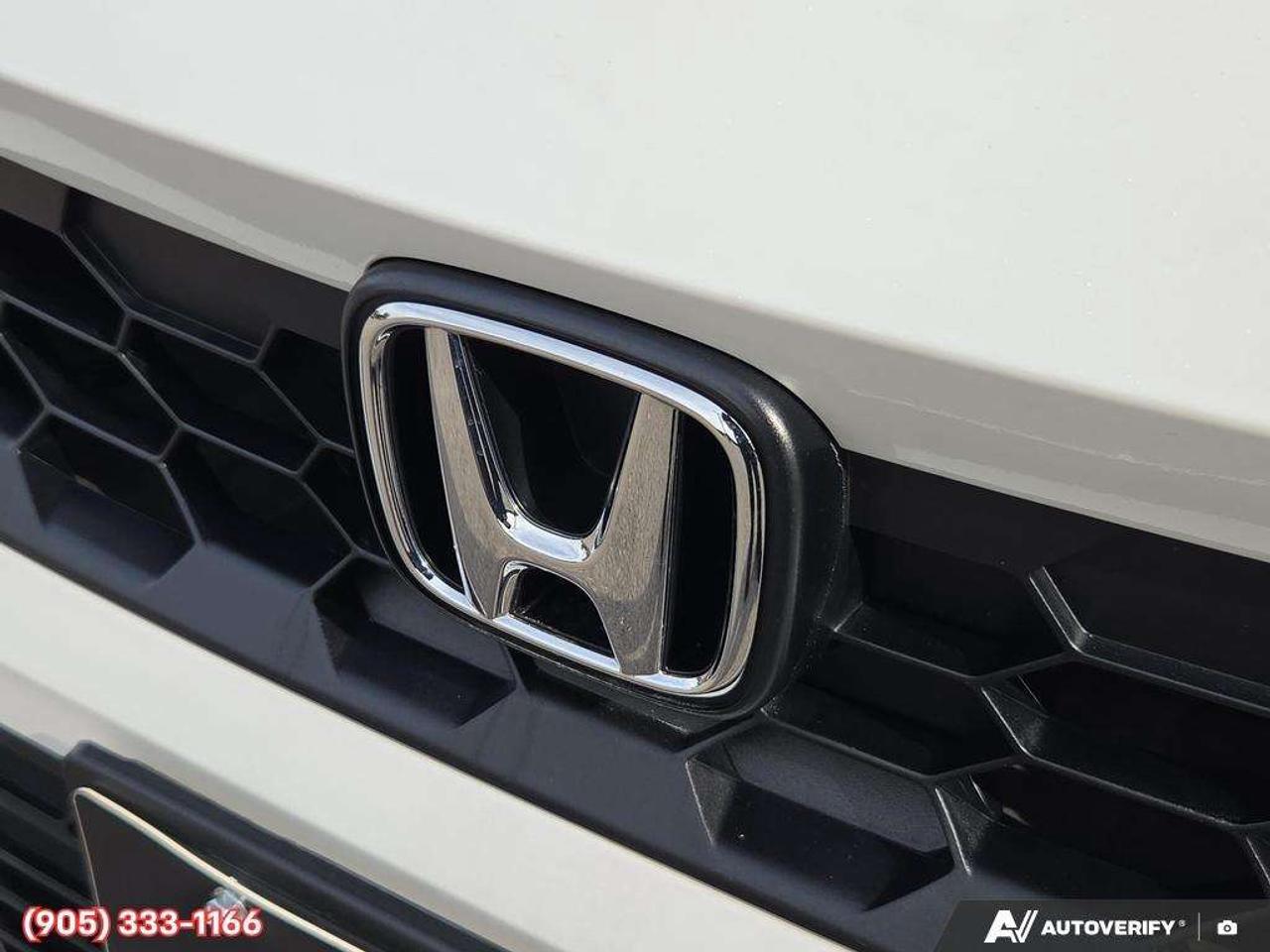 2023 Honda Civic Apple CarPlay & Android Auto • Power Sunroof • Built-In Navigation System • Built-In Wi-Fi Hotspot • Heated Front Seats • Photo