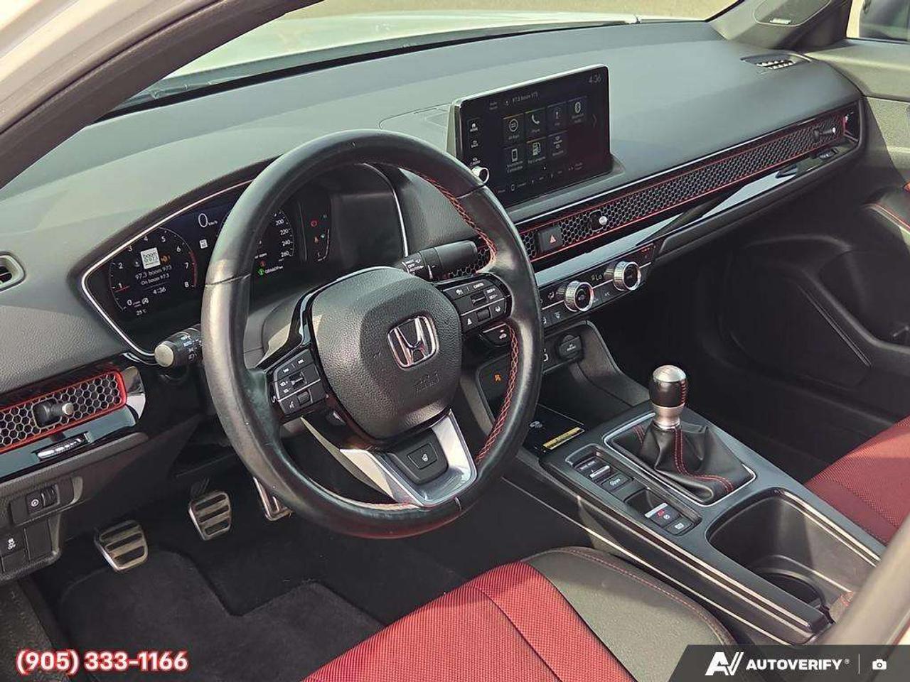 2023 Honda Civic Apple CarPlay & Android Auto • Power Sunroof • Built-In Navigation System • Built-In Wi-Fi Hotspot • Heated Front Seats • Photo