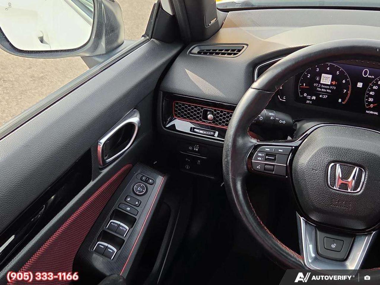 2023 Honda Civic Apple CarPlay & Android Auto • Power Sunroof • Built-In Navigation System • Built-In Wi-Fi Hotspot • Heated Front Seats • Photo