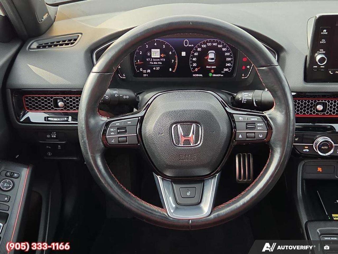 2023 Honda Civic Apple CarPlay & Android Auto • Power Sunroof • Built-In Navigation System • Built-In Wi-Fi Hotspot • Heated Front Seats • Photo