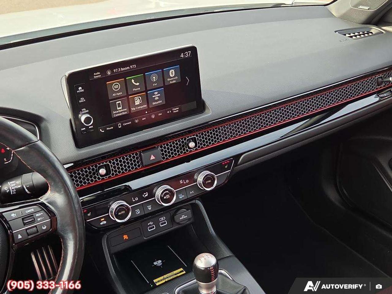 2023 Honda Civic Apple CarPlay & Android Auto • Power Sunroof • Built-In Navigation System • Built-In Wi-Fi Hotspot • Heated Front Seats • Photo