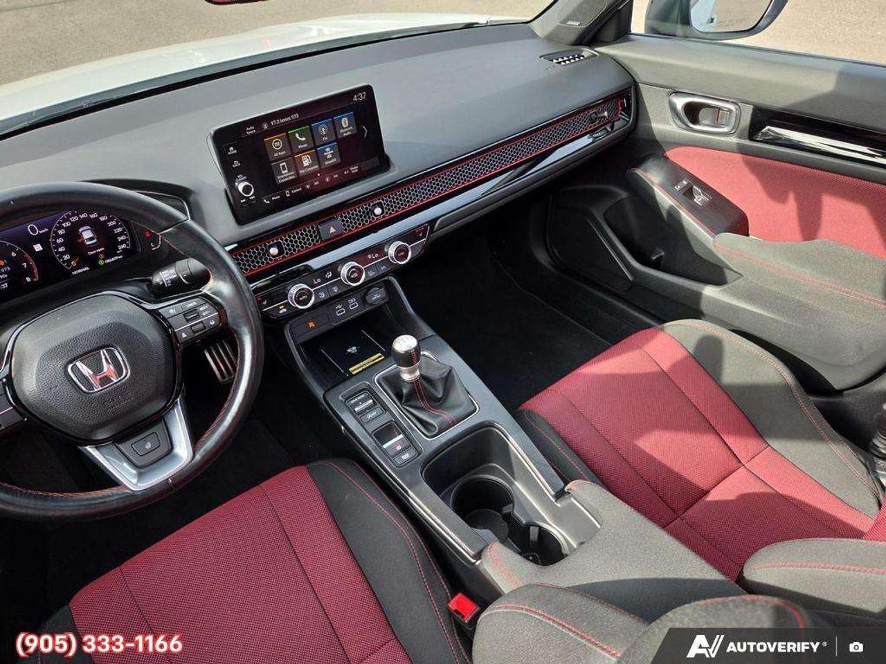 2023 Honda Civic Apple CarPlay & Android Auto • Power Sunroof • Built-In Navigation System • Built-In Wi-Fi Hotspot • Heated Front Seats • Photo