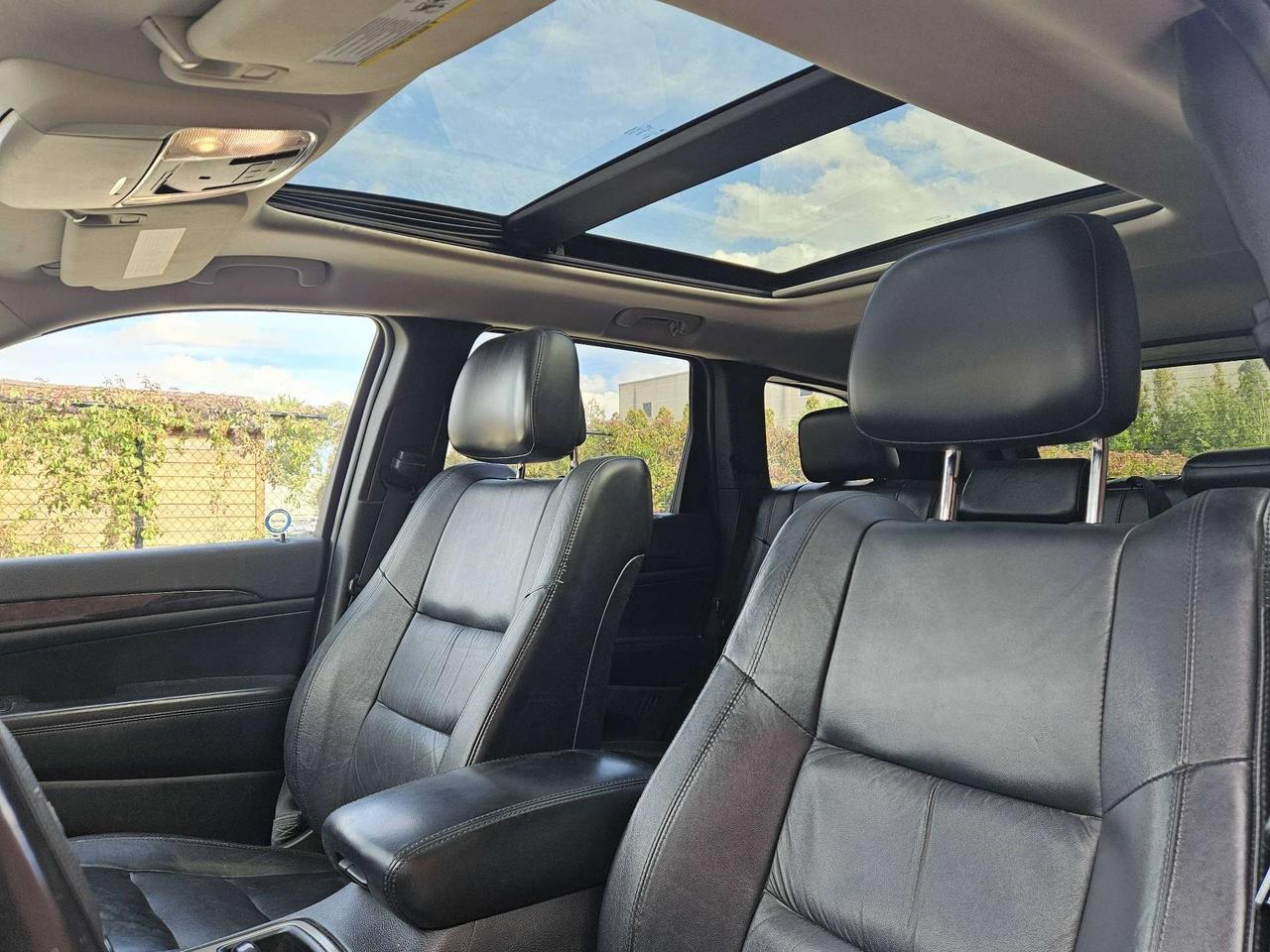 2012 Jeep Grand Cherokee 4WD Altitude *Ltd Avail*, Nav, Leather, Sunroof Photo