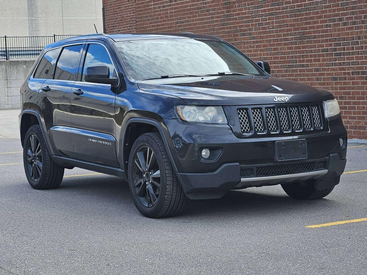 2012 Jeep Grand Cherokee 4WD Altitude *Ltd Avail*, Nav, Leather, Sunroof Photo