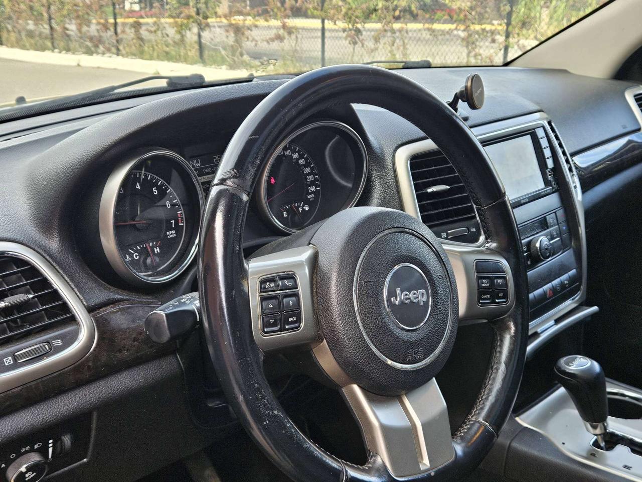 2012 Jeep Grand Cherokee 4WD Altitude *Ltd Avail*, Nav, Leather, Sunroof Photo