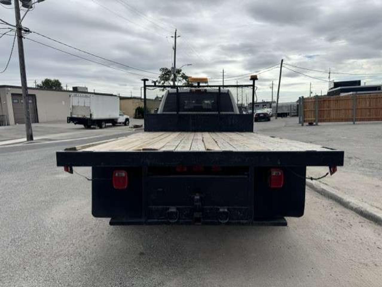2013 RAM 5500 SLT 4WD 6.7L CUMMINS DIESEL-12' FLAT DECK-CREW CAB Photo