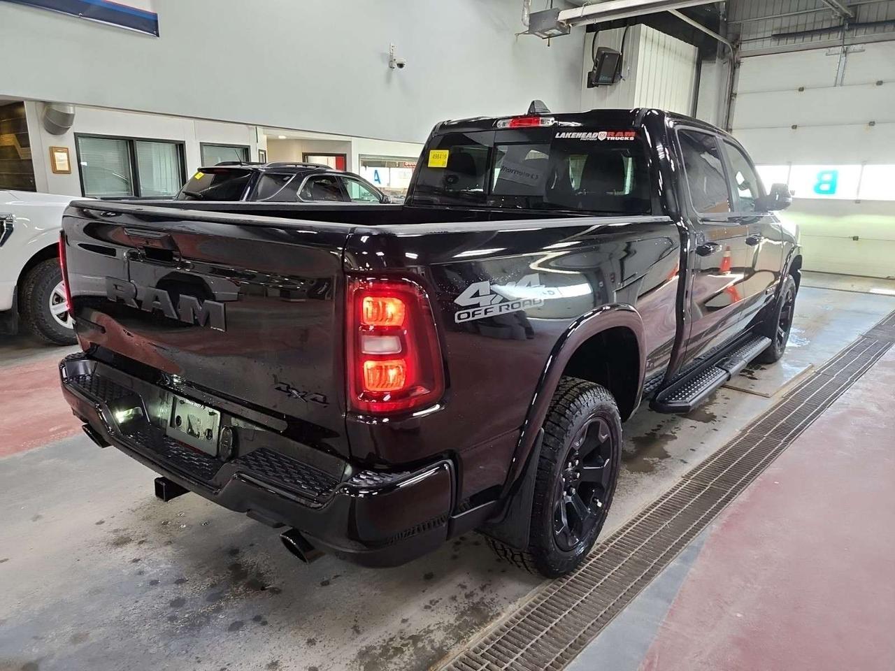 2026 RAM 1500 Big Horn   NIGHT EDITION   HEATED SEATING & STEERING WHEEL   12-INCH NAVIGATION   OFF-ROAD GROUP Photo