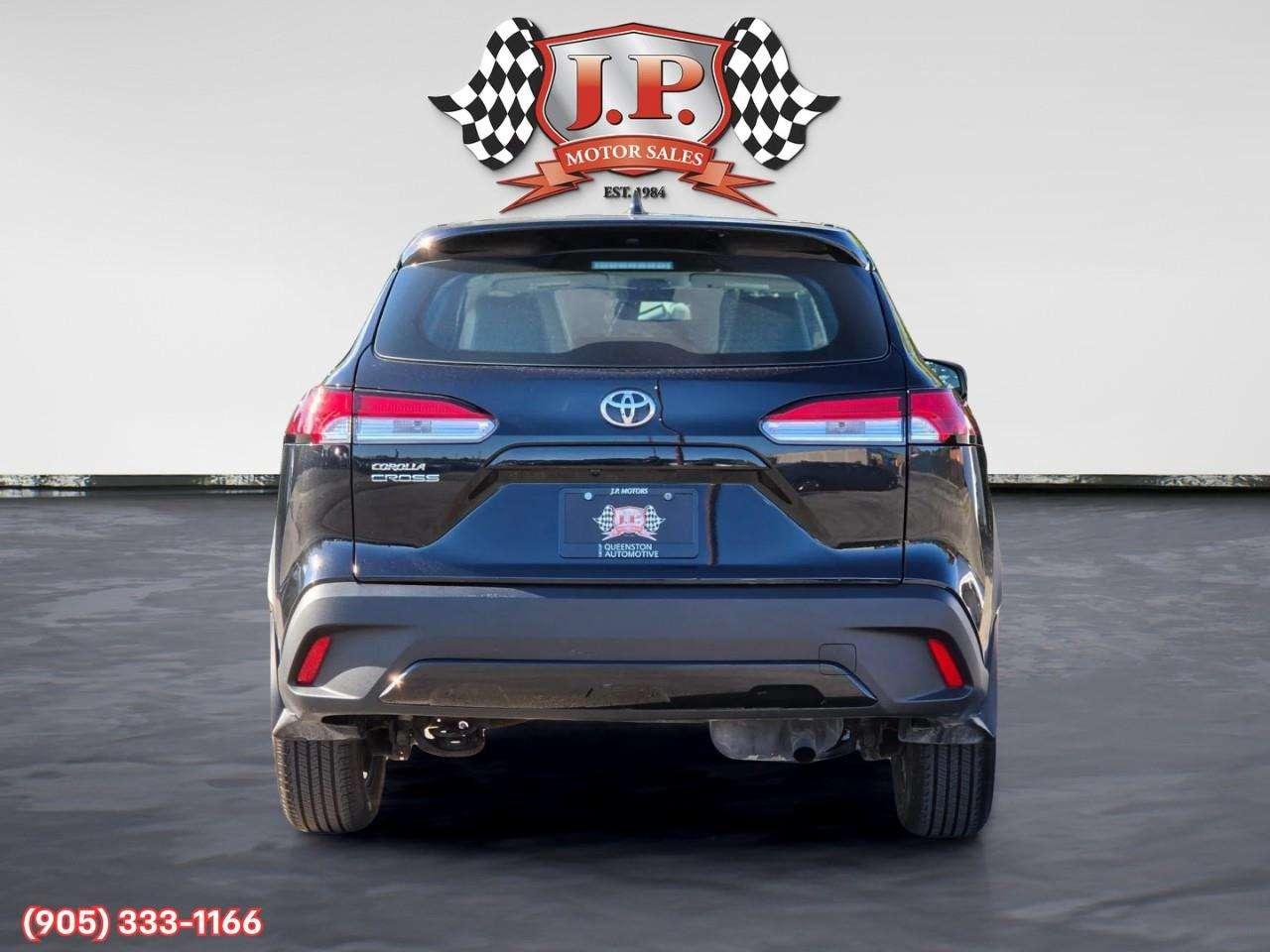 2022 Toyota Corolla Cross L Apple CarPlay & Android Auto • Heated Front Seats • Lane Assist • Keyless Entry • Backup Camera Photo