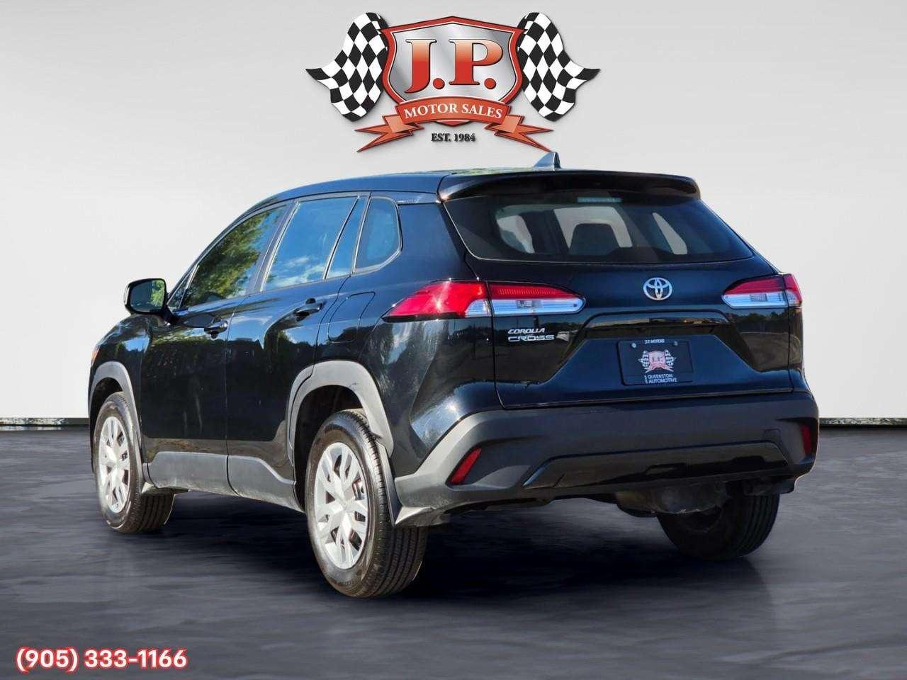2022 Toyota Corolla Cross L Apple CarPlay & Android Auto • Heated Front Seats • Lane Assist • Keyless Entry • Backup Camera Photo