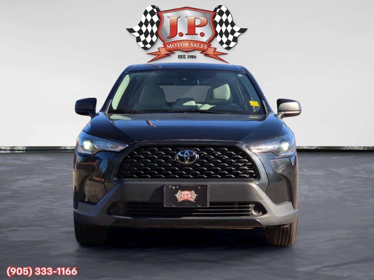 2022 Toyota Corolla Cross L Apple CarPlay & Android Auto • Heated Front Seats • Lane Assist • Keyless Entry • Backup Camera Photo