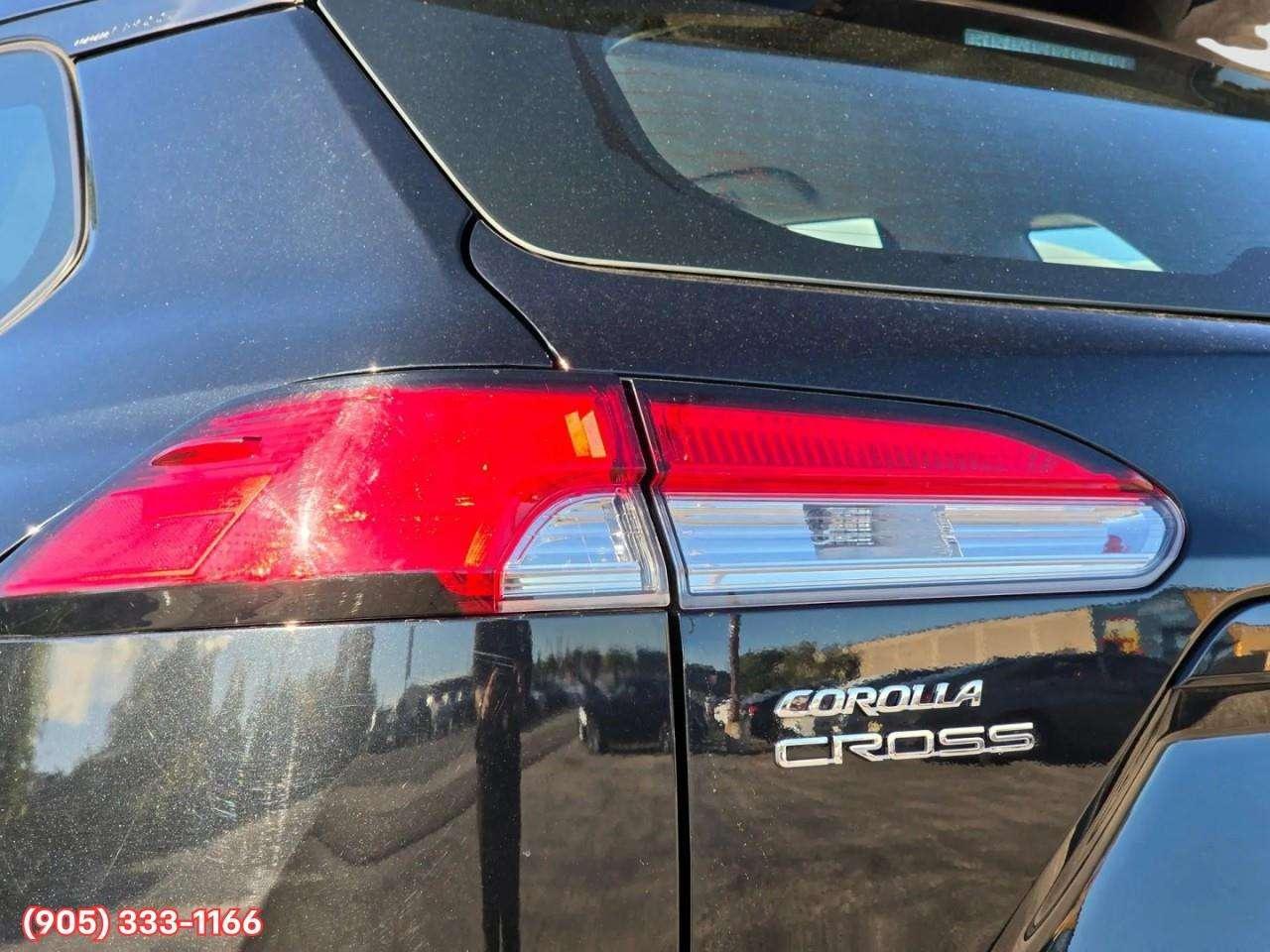 2022 Toyota Corolla Cross L Apple CarPlay & Android Auto • Heated Front Seats • Lane Assist • Keyless Entry • Backup Camera Photo