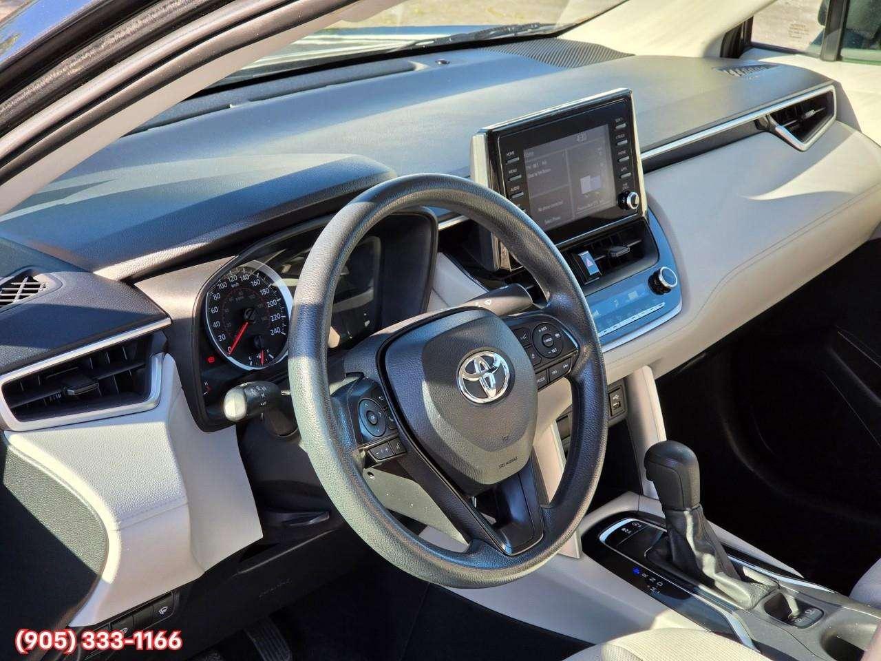 2022 Toyota Corolla Cross L Apple CarPlay & Android Auto • Heated Front Seats • Lane Assist • Keyless Entry • Backup Camera Photo