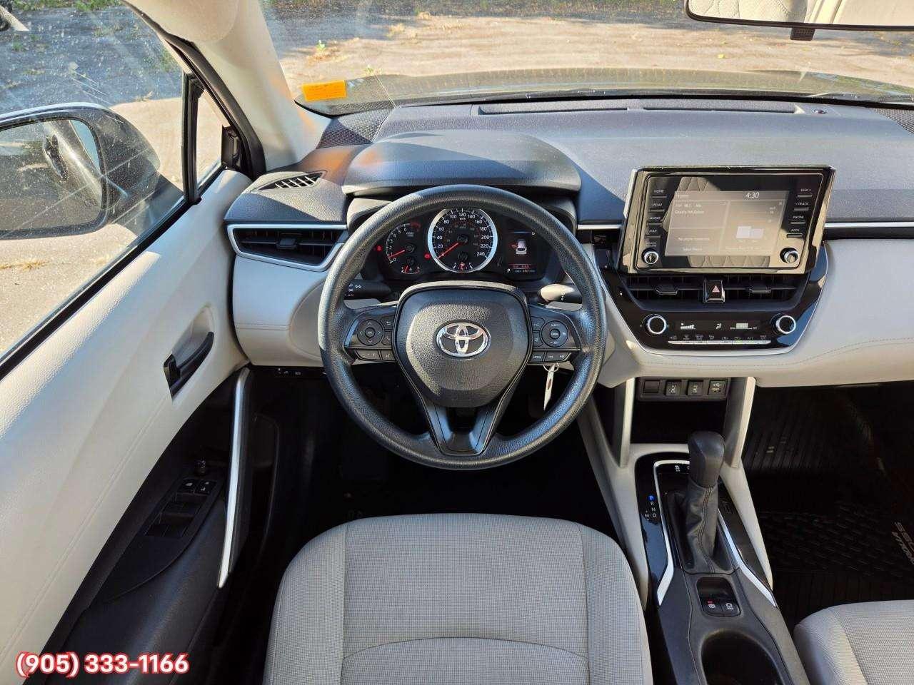 2022 Toyota Corolla Cross L Apple CarPlay & Android Auto • Heated Front Seats • Lane Assist • Keyless Entry • Backup Camera Photo