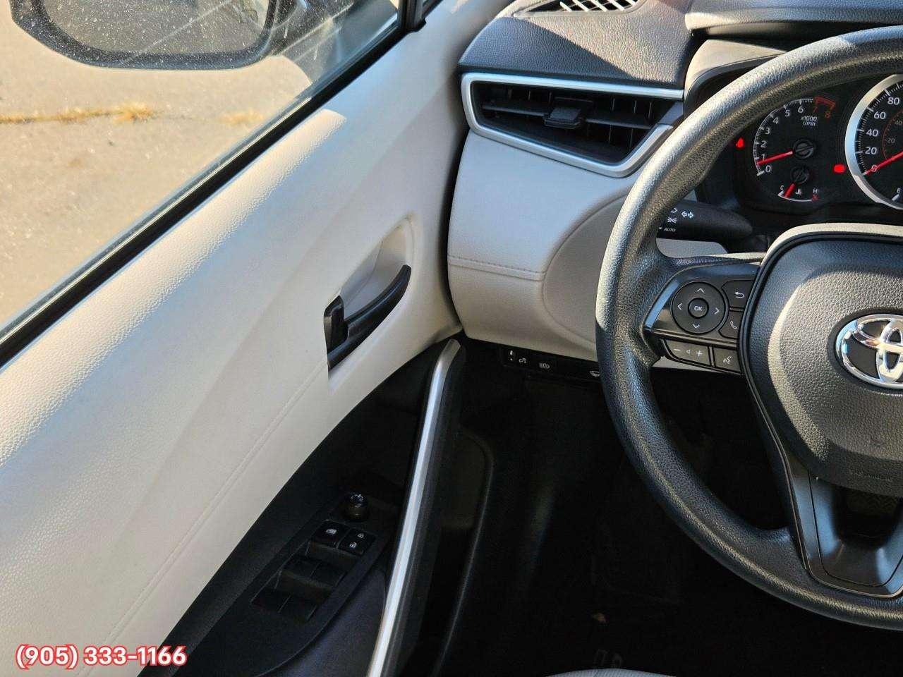 2022 Toyota Corolla Cross L Apple CarPlay & Android Auto • Heated Front Seats • Lane Assist • Keyless Entry • Backup Camera Photo