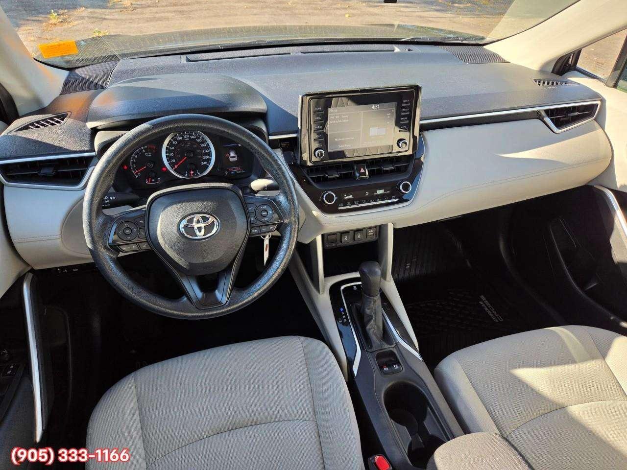 2022 Toyota Corolla Cross L Apple CarPlay & Android Auto • Heated Front Seats • Lane Assist • Keyless Entry • Backup Camera Photo